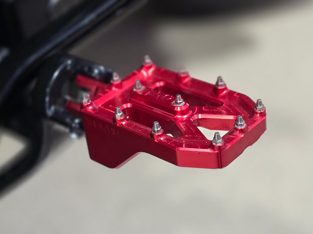 Aggressor Footpegs - Red. Fits Softail 2018up Front Rider