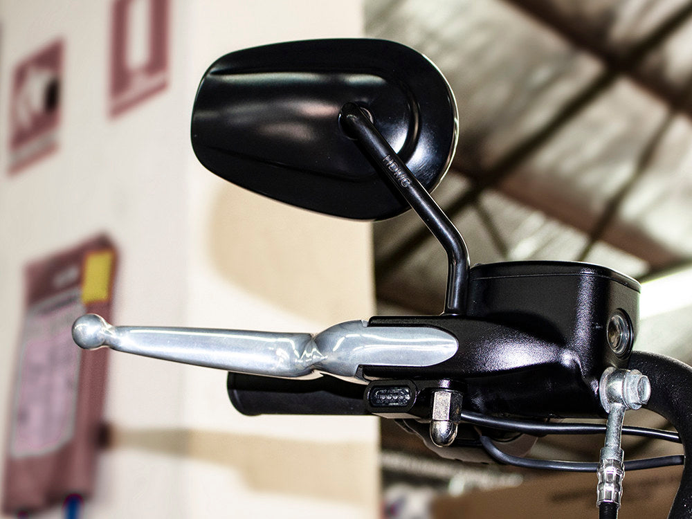 Under Perch Turn Signals - Black. Fits Softail 2015-2024 & Touring 2009-2023 Models with Cable Clutch.