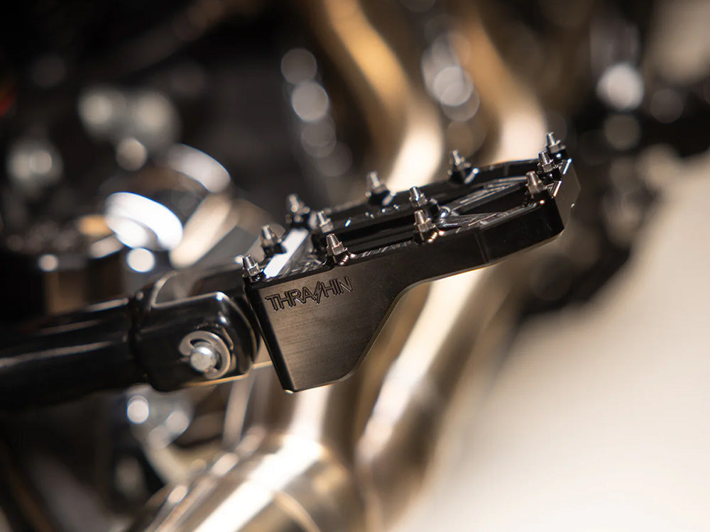 Aggressor Footpegs - Black. Fits Softail 2018up Rear Passenger