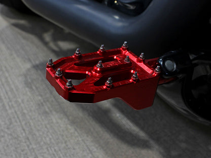 Aggressor Footpegs - Red. Fits Softail 2018up Front Rider