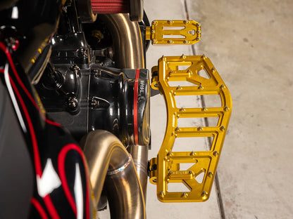 Aggressor Rider Floorboards - Gold. Fits Touring 1980up, FL Softail 1986-2017 & Dyna Switchback 2012-2016